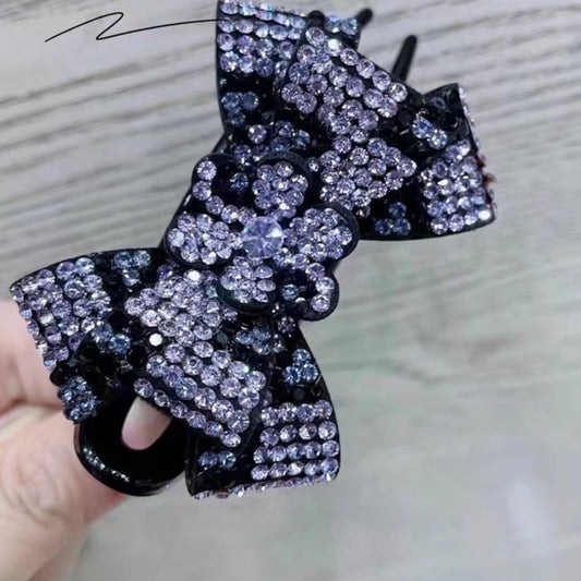 Accesorio para el cabello con pinza de tres dientes y diseño de mariposa con estampado de leopardo 