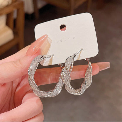 Wrapped metal earrings for women