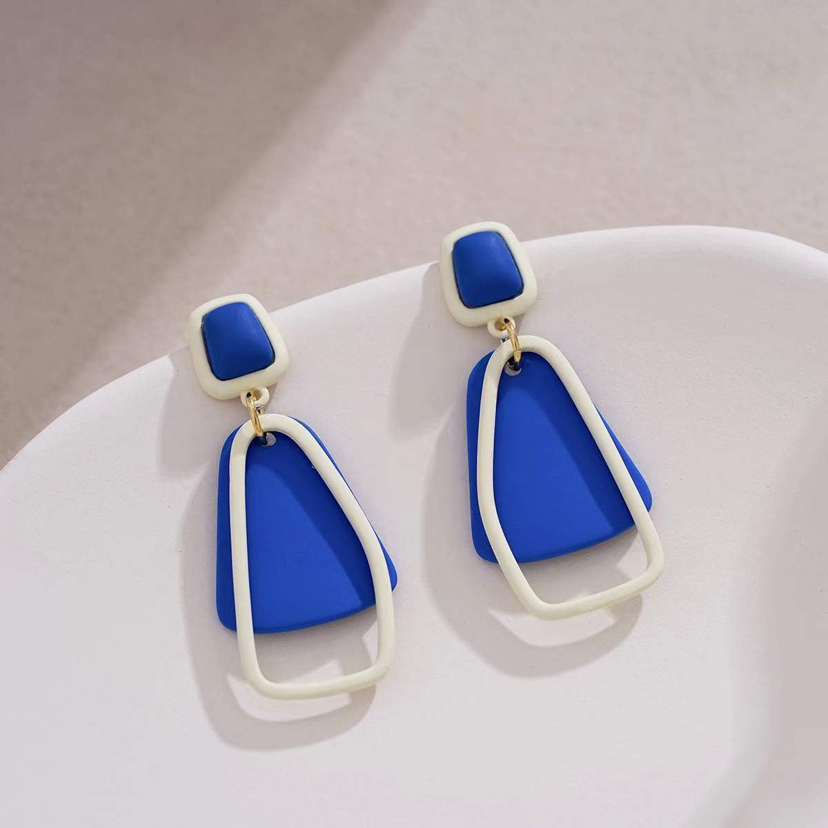 Klein blue stud earrings