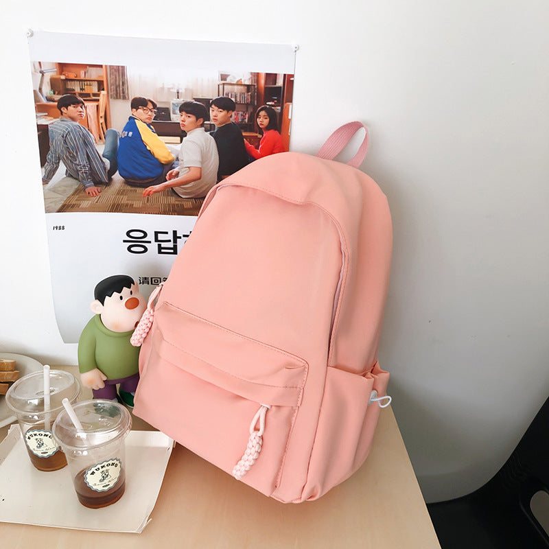 Solid color schoolbag women's simple backpack