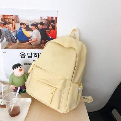 Solid color schoolbag women's simple backpack