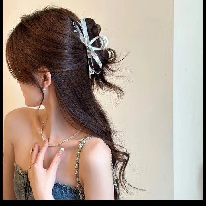 Large silver bow clip