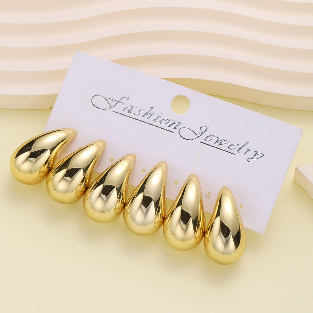 C-shaped teardrop earrings 3-piece set