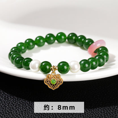 Imitation Hetian jade round bead bracelet.