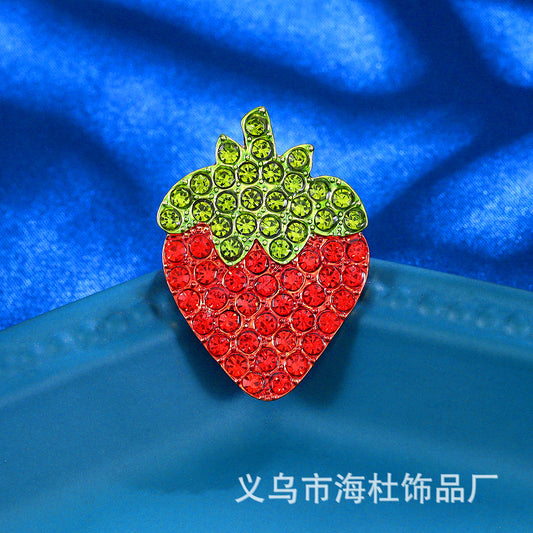 Simple red strawberry brooch with diamonds