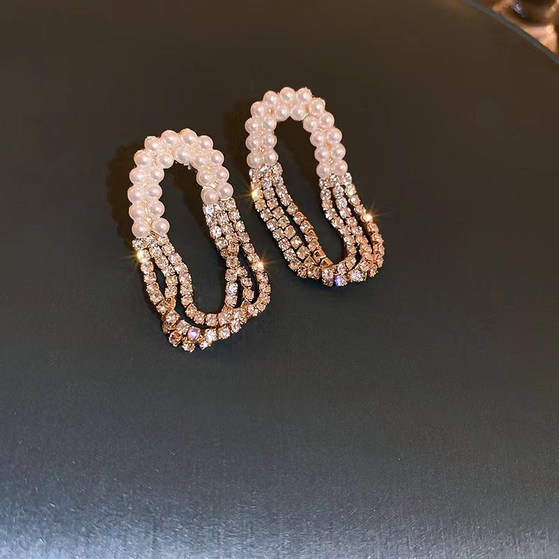 Pendientes de borlas ovaladas con perlas y diamantes