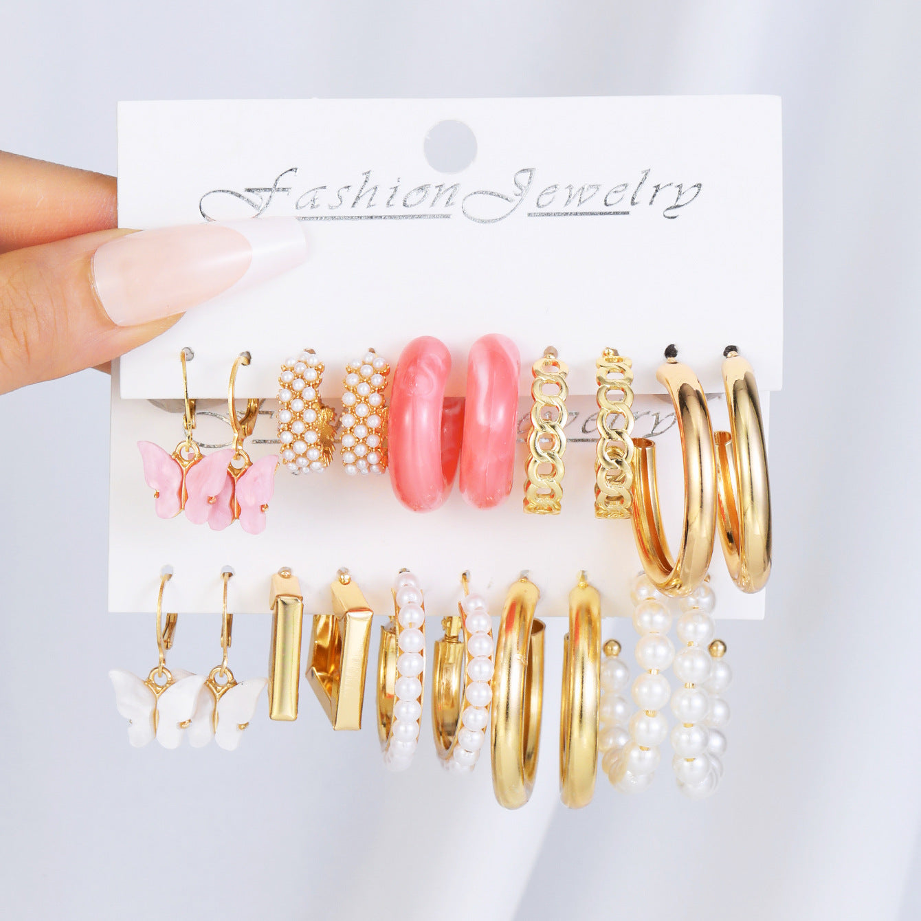 10 pairs of pink acrylic C-chain earrings