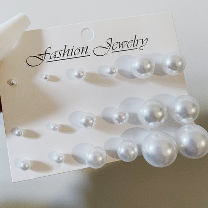 12 pairs of large and small pearl earrings