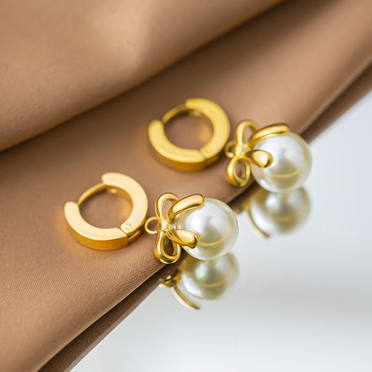 French bow pearl earrings