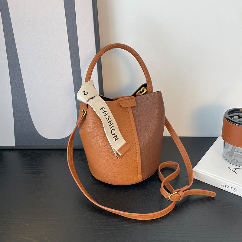 Stylish contrasting color portable messenger bucket bag