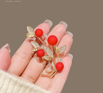 Red brooch high grade