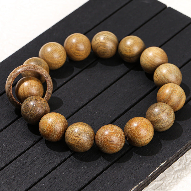 Green sandalwood running ring bracelet.