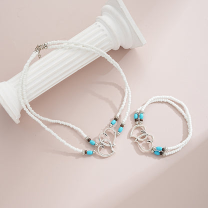 Conjunto de pulsera y collar con corazón de cuentas de arroz bohemias 