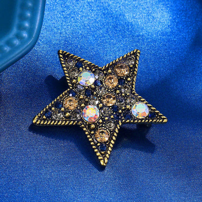 Pentagram brooch with diamonds