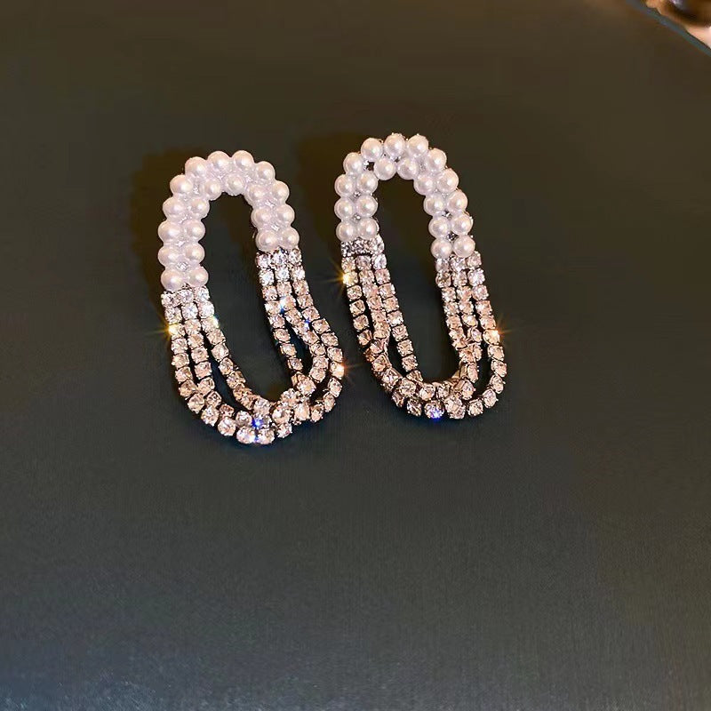 Pendientes de borlas ovaladas con perlas y diamantes