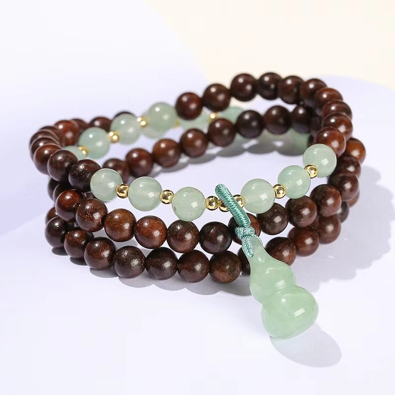 Pulsera de sándalo verde Colgante de calabaza de jade Dongling verde 