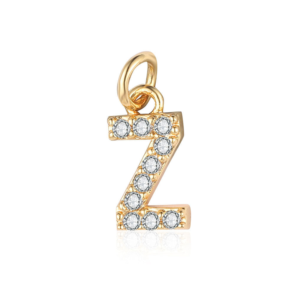 Copper zircon yellow gold letter pendant.