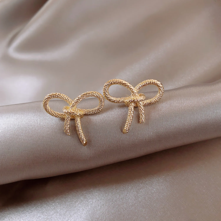 Bow earrings metal