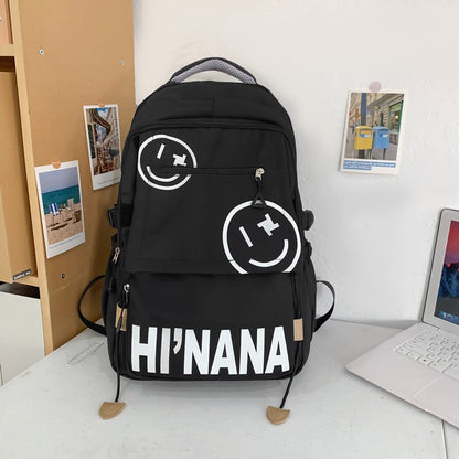 Backpack with smiley face print