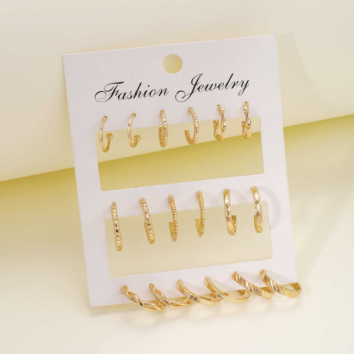 Gold twist earrings set 9 pieces