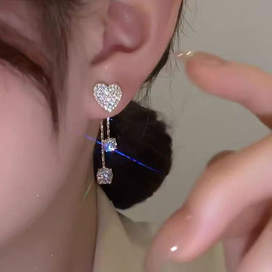 A pair of two-piece earrings