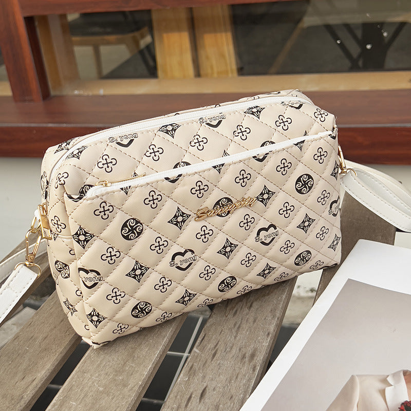 Three-layer zipper embroidered shoulder bag