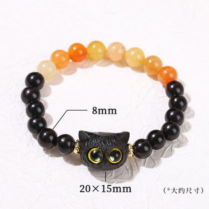 Natural red Dongling spell ebony cat head bracelet.