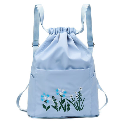 Foldable embroidered travel bag