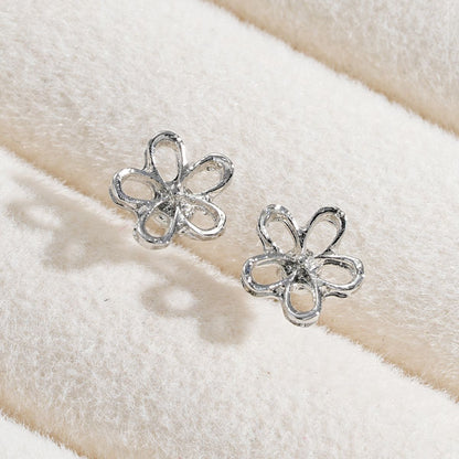 Silver hollow flower earrings