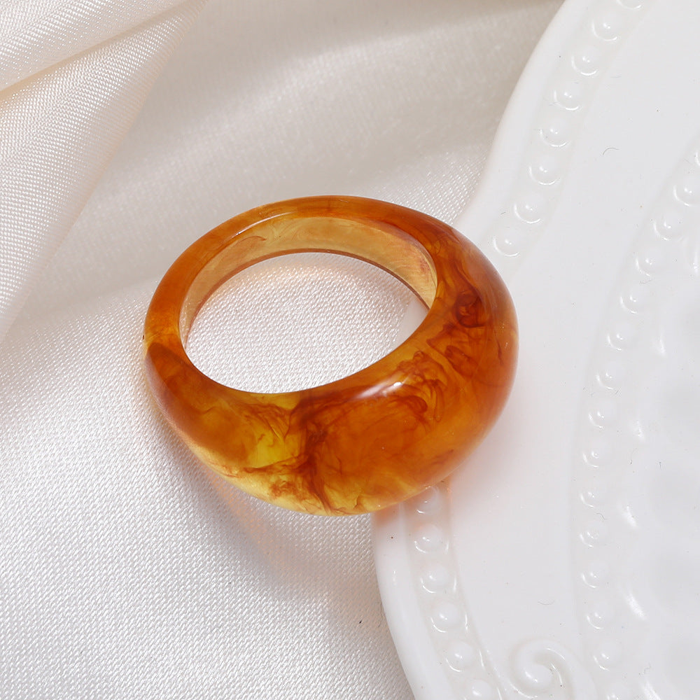 Colored resin ring