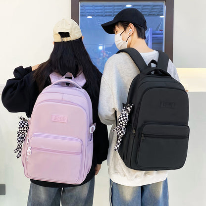 Men's and women's solid color leisure travel backpack wholesale