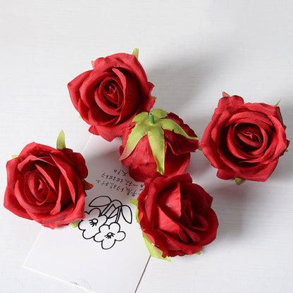 Artificial rose flower head