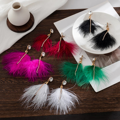 Feather fringed imitation pearl earrings