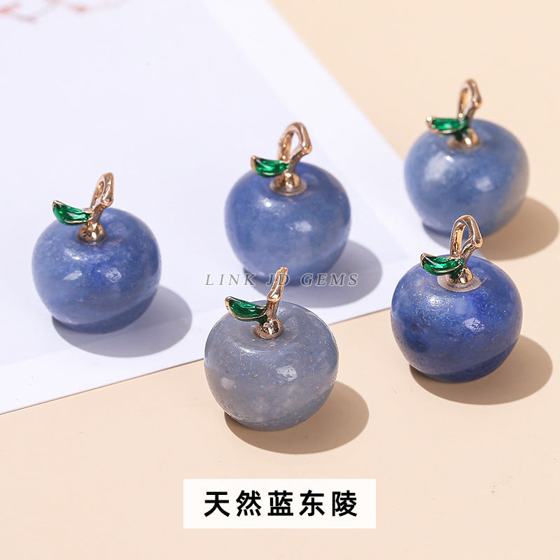 Natural stone crystal apple pendant.