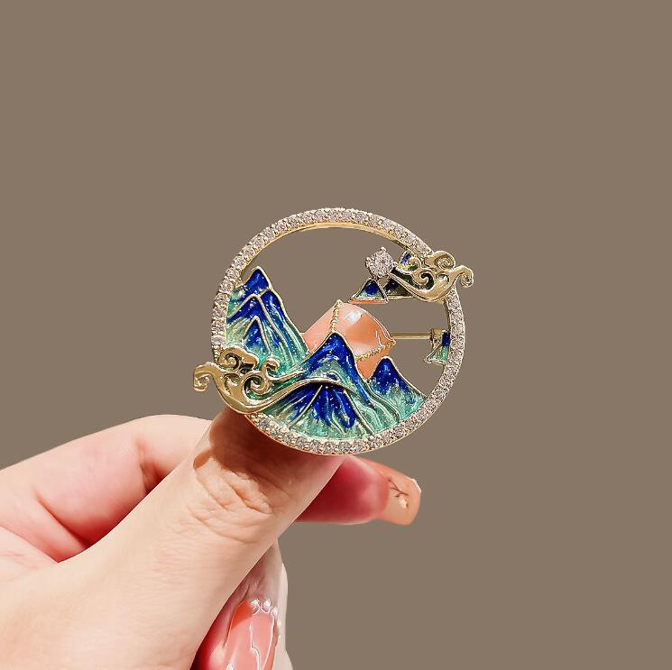 Thousand miles of rivers and mountains brooch