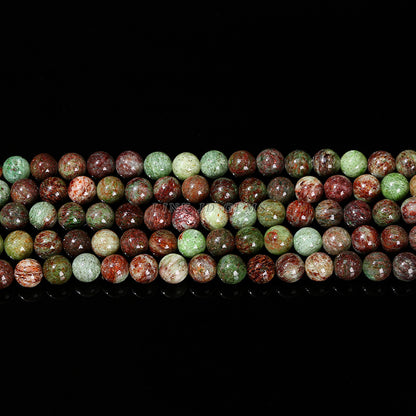 Natural green colored stone round bead jade bracelet.