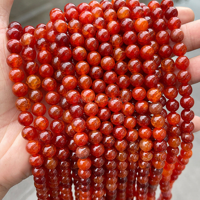 Cuentas sueltas de ágata con patrón de dragón rojo que sobresalen de las cuentas redondas 