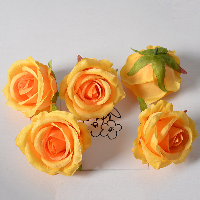 Artificial rose flower head