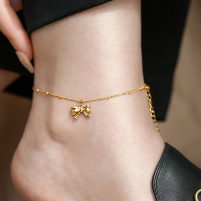 Gold bow anklet