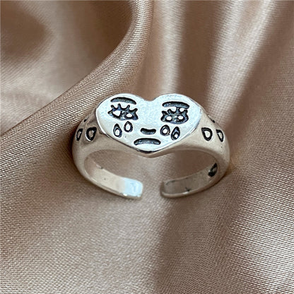 Love crying face ring