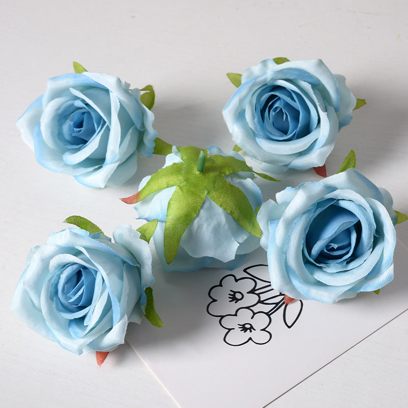 Artificial rose flower head