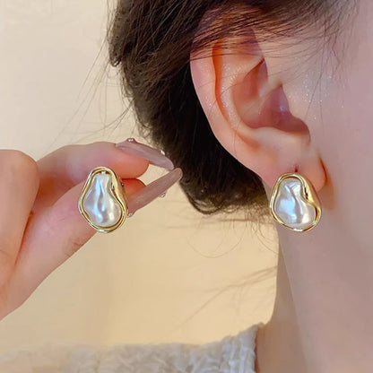 Pendientes de perlas de forma especial de estilo barroco antiguo 