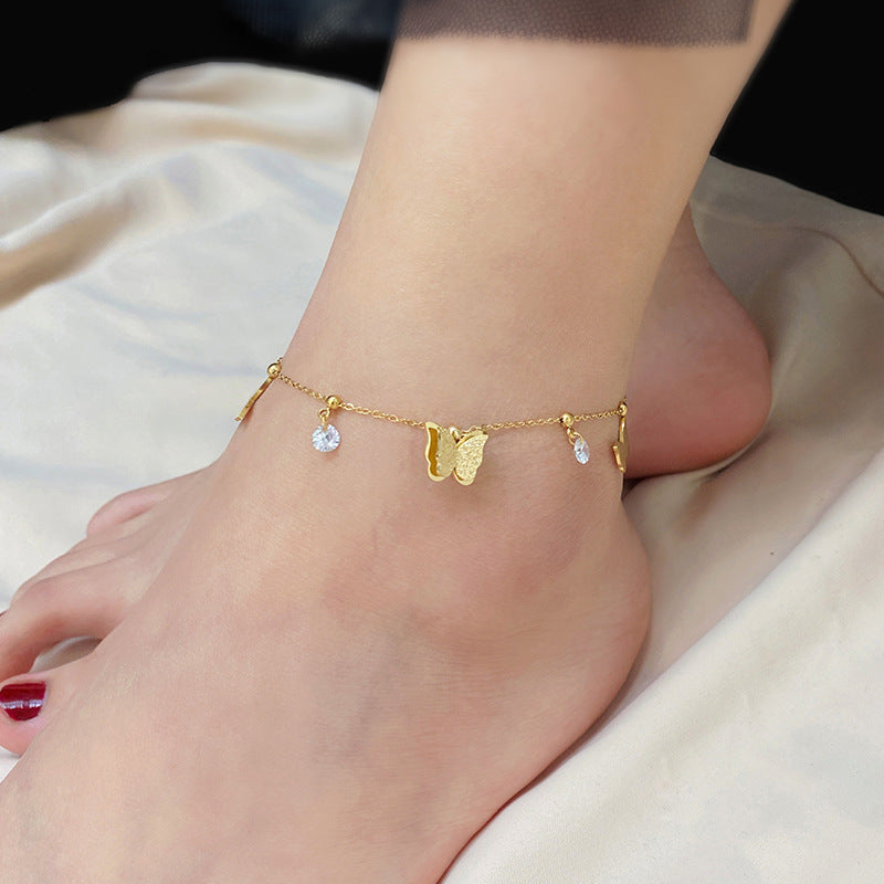 Golden butterfly anklet woman