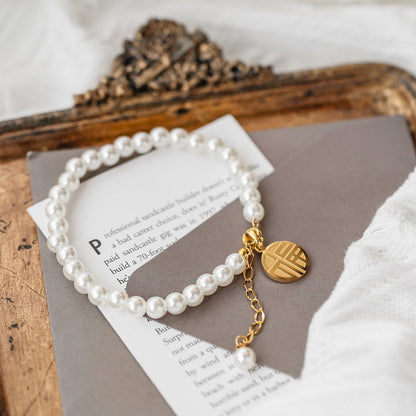 Pearl fringed Fu brand bracelet