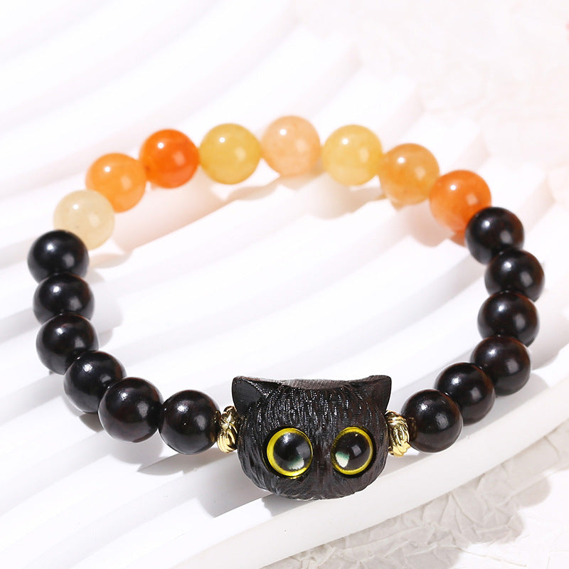 Natural red Dongling spell ebony cat head bracelet.