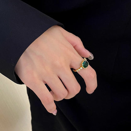 Emerald zircon ring