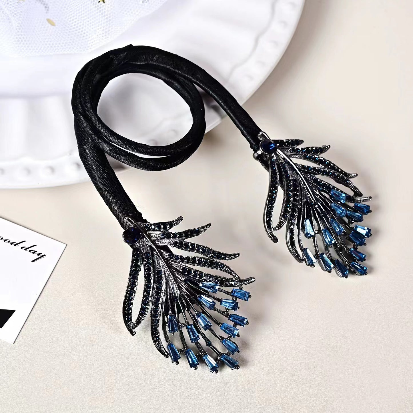 Blue feather hair reel, headdress