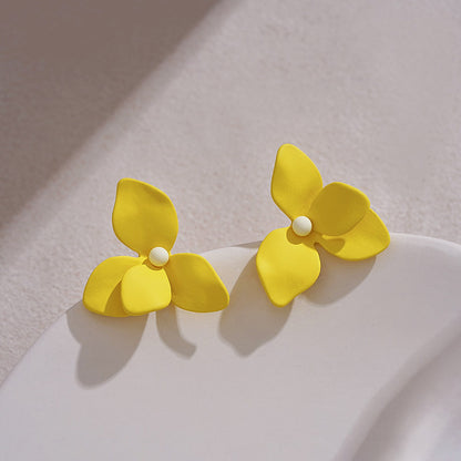 Yellow blue stud earrings niche