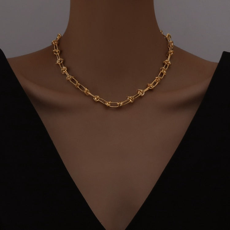 Knotted thorn chain necklace