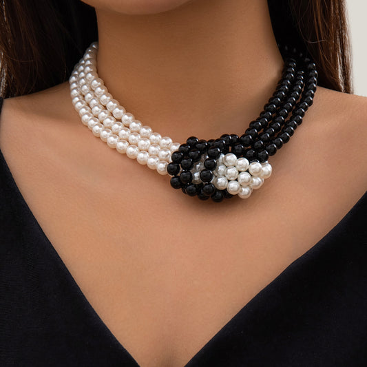 Splicing and knotting multi-layer imitation pearl necklace